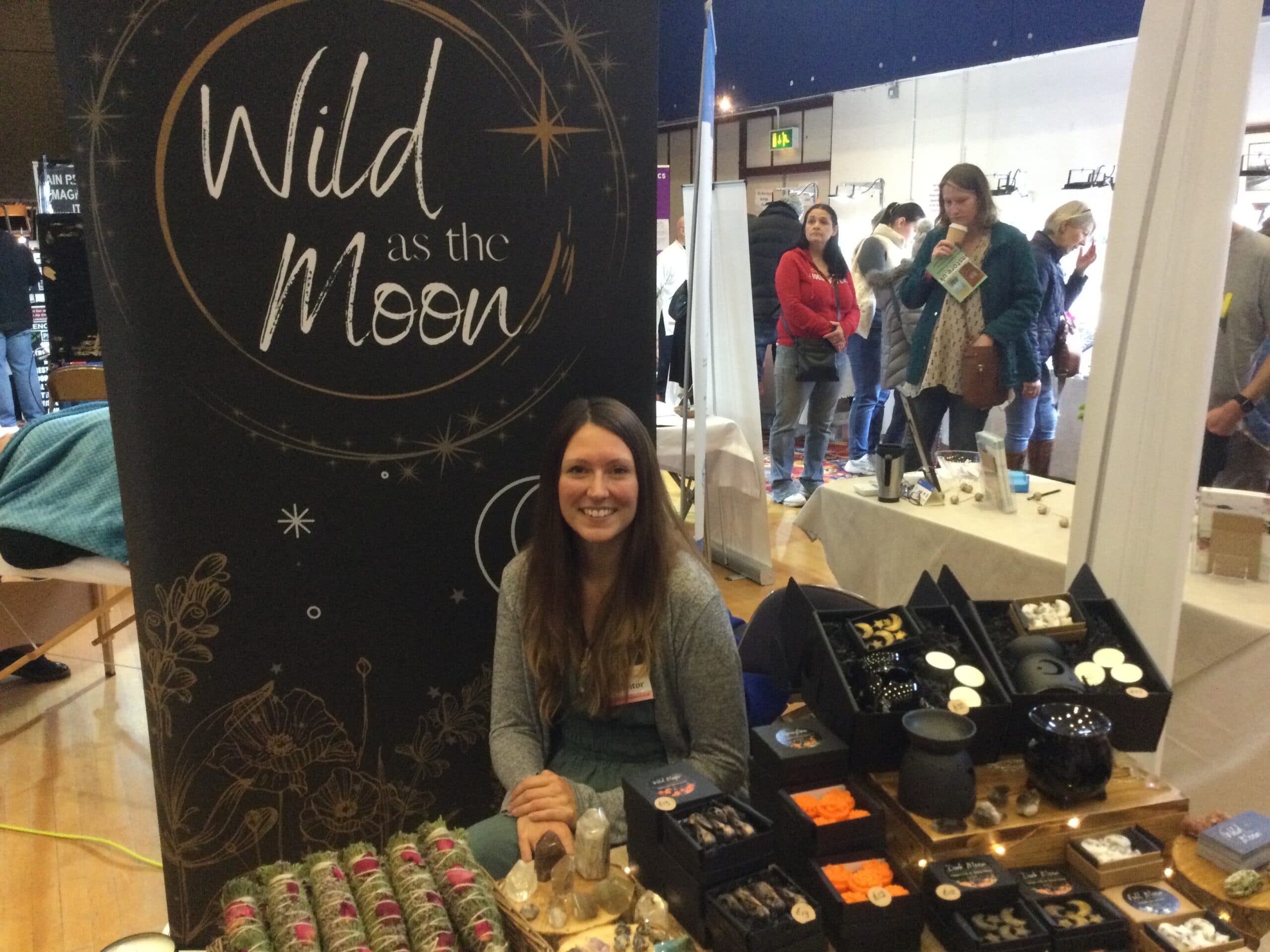 Wild as the Moon stall with candles and crystals